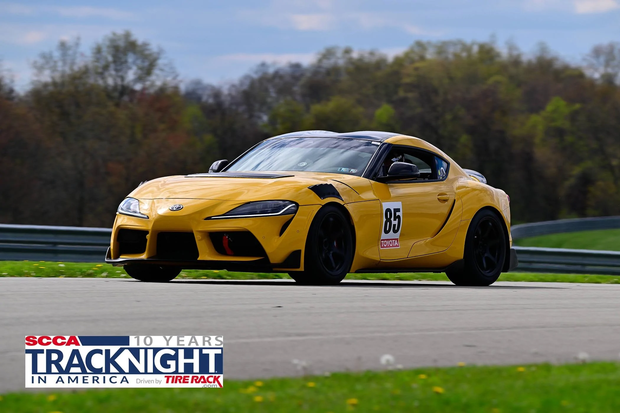 24 SCCA TNiA PittRace Adv Yellow Toyota Supra-2.jpg
