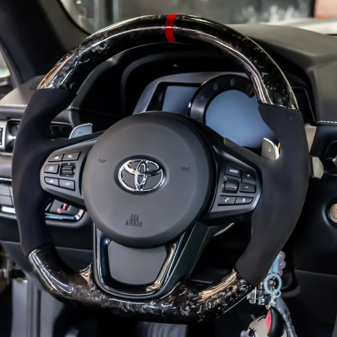 Upgradedcarbonfibersteeringwheel-A90ToyotaSupra_a90_supra_b58_carbonfiber_toyota.webp