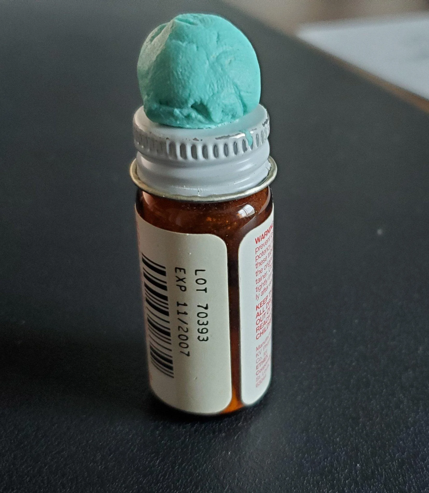 Red start button putty.webp