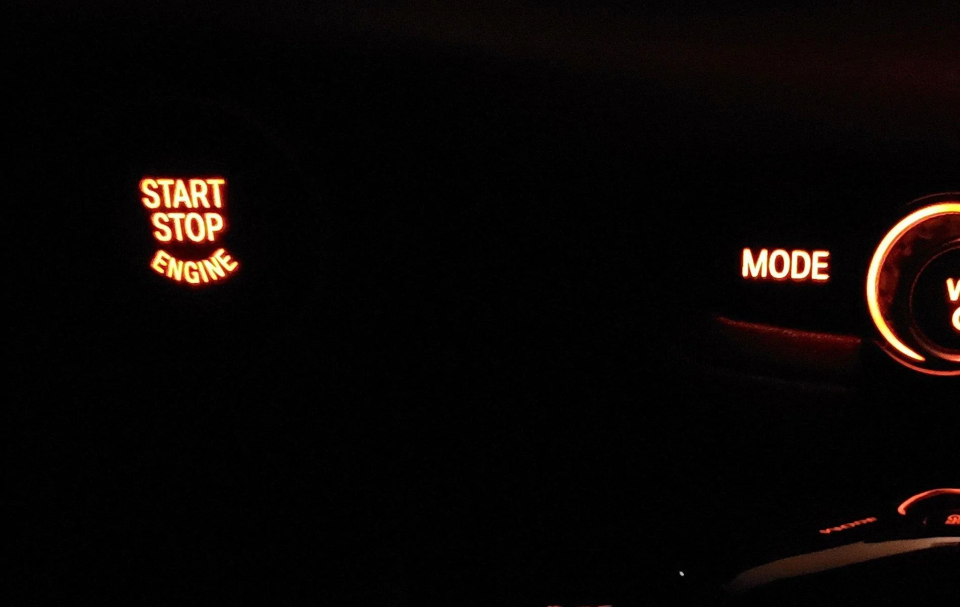 Red start button illuminated 2.webp
