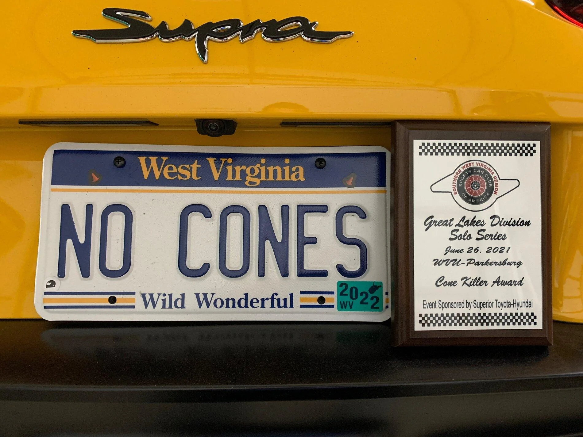 license plate and trophy.webp