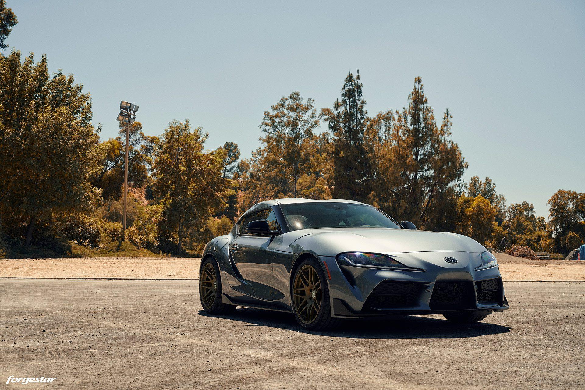 gray-a90-toyota-supra-bronze-wheels-tuned-forgestar-f14-purist-group-b.jpeg