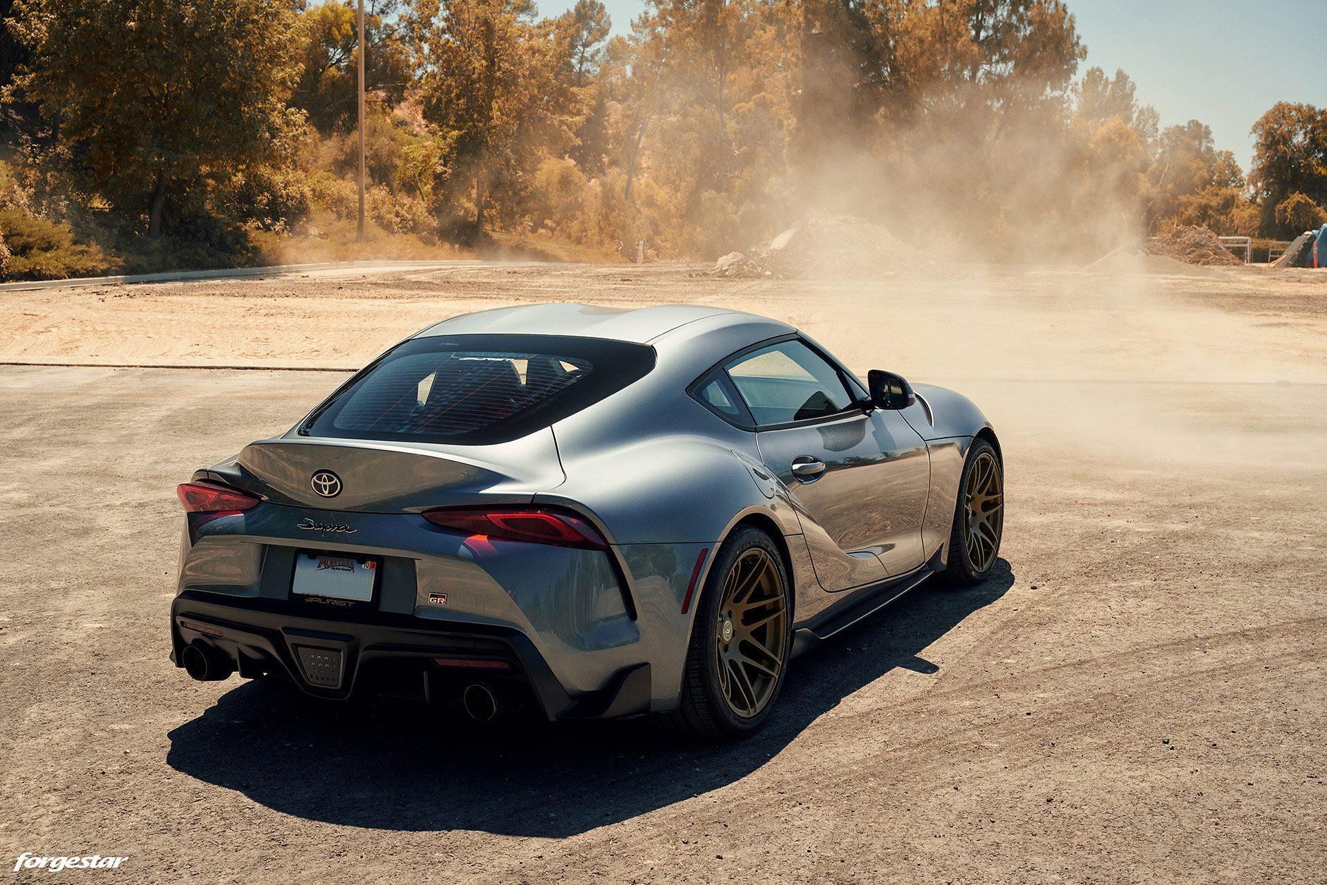 gray-a90-toyota-supra-bronze-wheels-tuned-forgestar-f14-purist-group-h.jpeg